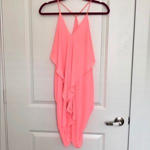 Slinky spaghetti strap coral dress.